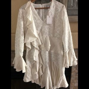 Dress white with lace and ruffles